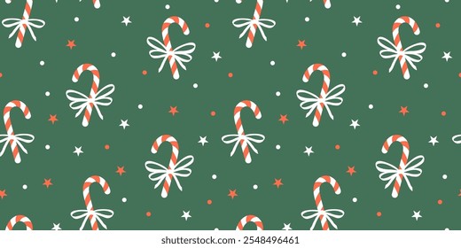 Seamless Christmas pattern with candy canes, bows and stars on green background. Winter vector decor. Sample for wrapping paper, fabric, cover.