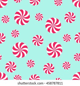 Seamless Christmas pattern with candy on mint green background. Happy New Year and Merry Xmas background. Vector winter holidays print for textile, wallpaper, fabric, wallpaper.