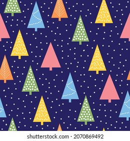 Patrón de Navidad sin inconvenientes. árboles de Navidad abstractos de colores y puntos blancos de nieve en un fondo azul. textura vectorial. impresión de moda para textiles y embalajes.