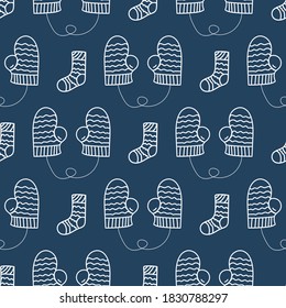 Seamless Christmas pattern with cozy and warm socks and mittens