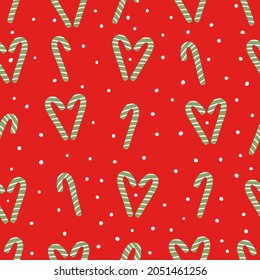 Seamless Christmas pattern. cute caramel canes and snow on a red background. vector texture. fashionable print for textiles, postcards and packaging.