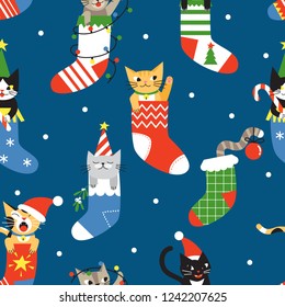 Seamless Christmas pattern with cute cartoon cats in socks