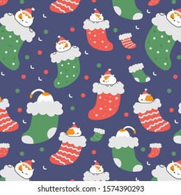 Seamless Christmas pattern with cute cartoon cats in socks, merry christmas and happy new year of the mouse 2020