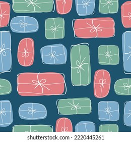 Patrón de Navidad sin inconvenientes. regalos de color sobre fondo azul oscuro. Textura vectorial. impresión de moda para textiles y papel pintado, embalaje y postales.