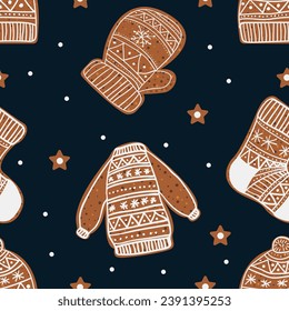 Seamless Christmas pattern with gingerbread cookies. Christmas cookies on a dark background.