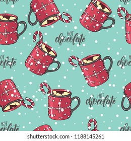 Seamless Christmas pattern with hand drawn colored cup of hot chocolate with marshmallow and candy. lettering phrase "hot chocolate". Can be used for wallpaper, web page background, surface textures.