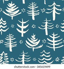 Seamless Christmas pattern with hand drawn elements. Cute Christmas trees. Winter background. Vector illustration