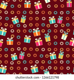 Seamless Christmas pattern with the image of gift boxes and rings.
