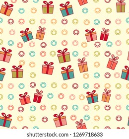 Seamless Christmas pattern with the image of gift boxes and rings.

