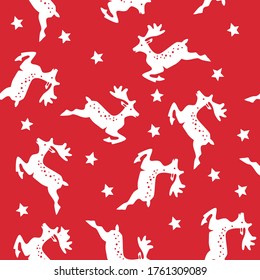 Seamless Christmas pattern with jumping white deer and stars on red background . Vector illustration.