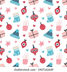 Seamless Christmas pattern with knitted hats, socks and gift boxes. Hand drawn vector background. Winter mood. Design for seasonal textile, prints, scrapbook, greeting card, wrapping paper.