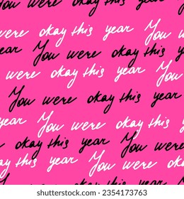 Seamless Christmas pattern with lettering - You were are okay this year. A pattern with handwritten text on a pink background.