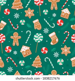 Seamless Christmas pattern with lollipops candy cane gingerbread cookies