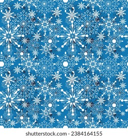Patrón navideño sin inconvenientes de muchos tipos de copos de nieve blancos y fondo azul.