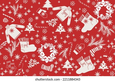 seamless christmas pattern with mittens, socks, fir branches and other elements on red background. vector design for paper, fabric and other surface