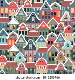 Seamless Christmas pattern with old vintage houses and roofs under the snow.. Vector  illistration. 
