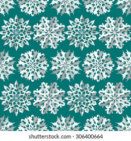 Seamless christmas pattern. Origami, paper  white snowflakes silhouettes on turquoise, aqua background. Paper cut out convex sign with shadow. Winter theme texture. Vector illustration.