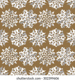 Seamless christmas pattern. Paper snowflake origami white icon silhouettes on gold background. Paper cut out convex sign with shadow. Winter theme texture. Vector illustration.