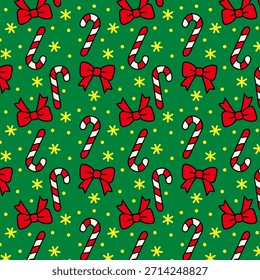 Seamless Christmas pattern with red and white candy canes and red ribbons on a green background. Small yellow circles and snowflake accents add a festive touch.