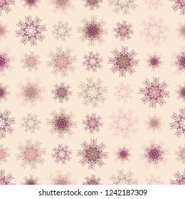 Seamless Christmas pattern with a pattern of snowflakes.

