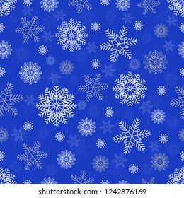 Seamless Christmas pattern with a pattern of snowflakes.
