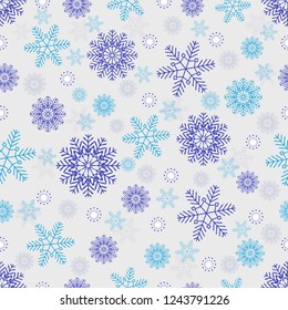 Seamless Christmas pattern with a pattern of snowflakes.
