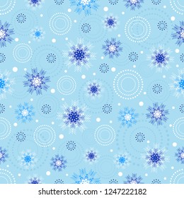 Seamless Christmas pattern with a pattern of snowflakes.
