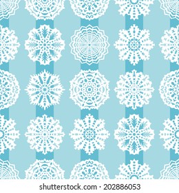 Seamless Christmas pattern with snowflakes 