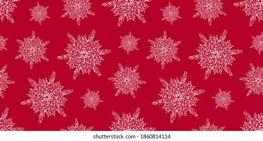 Seamless Christmas pattern with snowflakes on red background. Hand drawn snowlake. Vector festive background. Good for wrapping paper, textile, paper cards etc.