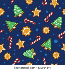 Seamless Christmas pattern with sweets on a blue background