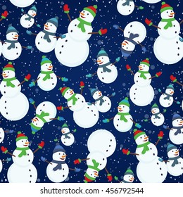 Seamless Christmas pattern with christmas tree, snowman and snowflakes on dark blue background.