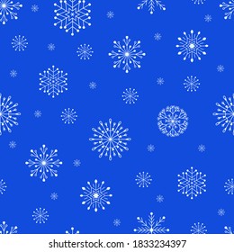 Seamless Christmas pattern of winter snowflakes. Vector illustration.