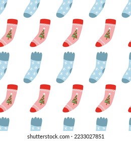 Seamless Christmas pattern with xmas socks. Happy New Year and Merry Xmas background. Winter holidays texture.