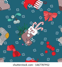 Seamless Christmas patterns, for packaging, fabric, wallpaper in the form of boots, festive red boots, socks, candies, berries, stars, on a dark turquoise background.