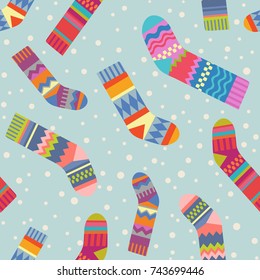 seamless christmas stocking pattern with colorful patterned socks