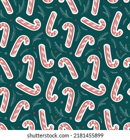 Seamless christmas vector pattern with candy canes, branches and stars. Vector holiday background. 
New Year mood. Design for winter holidays greeting season wrapping papers, textiles, wallpaper. 