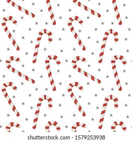 Seamless Christmas vector pattern. Stripped candy canes isolated on white background. Small grey stars. Festive illustration. Cute doodle art. Perfect for wallpaper or fabric.