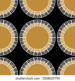 Seamless circular ethnic pattern on a black background. EPS10 Illustration.