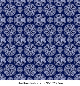 Seamless circular pattern. Ornamental texture. Blue and white graphics, painted by hand. For the design and decoration background, wallpaper, packaging, fabrics, textiles.
