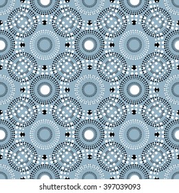 Seamless circular pattern. The rhythmic structure of circles and dots of different sizes, snowy schedule.