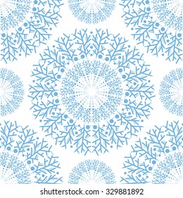 Seamless circular pattern. Winter Christmas snowflakes for your design. It can be used in the design of packaging, tissue wrappers, textiles, wallpaper.