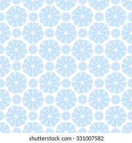 Seamless circular pattern. Winter Christmas snowflakes for your design. It can be used in the design of packaging, tissue wrappers, textiles, wallpaper.