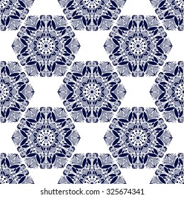 Seamless circular pattern of winter snowflakes. Ornamental texture, winter flowers. The structure of the complex shapes of snow. 