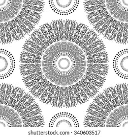 Seamless circular pattern for your design. Black and white graphics, painted hands. For the design and decoration background, wallpaper, packaging, fabrics, textiles.