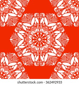 Seamless circular pattern for your design. Ornament of mandalas. Orange and white graphics, painted hands. For the design and decoration background, wallpaper, packaging, fabrics, textiles. 