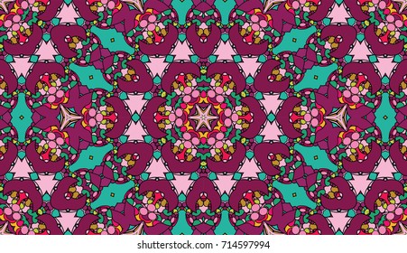 Seamless circular vector pattern. Colored decorative repainting background with tribal and ethnic motifs. Abstract floral geometric lace. Symmetrical flower ornament.