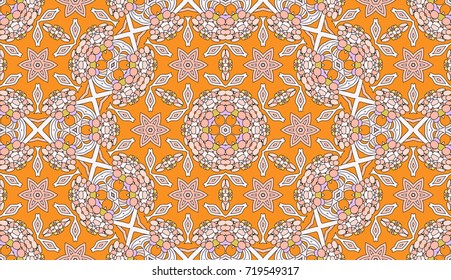 Seamless circular vector pattern. Colored decorative repainting background with tribal and ethnic motifs. Abstract floral geometric lace. Symmetrical flower ornament.