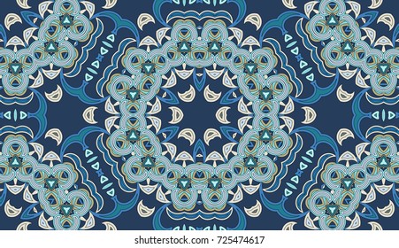 Seamless circular vector pattern. Colored decorative repainting background with tribal and ethnic motifs. Abstract floral geometric lace. Symmetrical flower ornament.