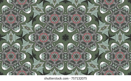 Seamless circular vector pattern. Colored decorative repainting background with tribal and ethnic motifs. Abstract floral geometric lace. Symmetrical flower ornament.