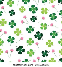 Seamless clover leaves and flower background for St Patrick's day. 